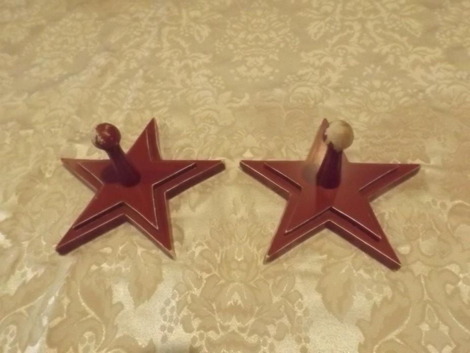 2 Barn red Americana star wall hooks.