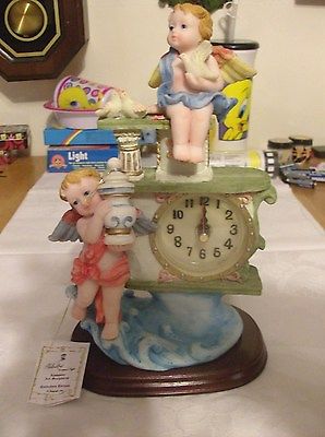 Cherub Alabaster Art Sculpture. Collectors Edition Wood Base