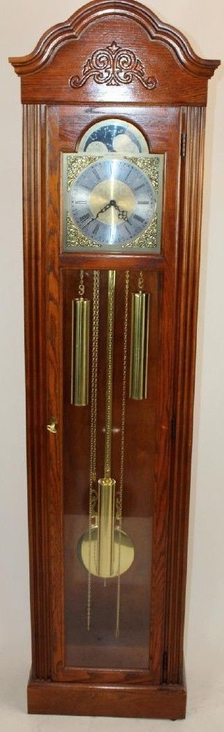 HOWARD MILLER Oak Grandfather Clock with Brass MoonPhase Dial Model 610