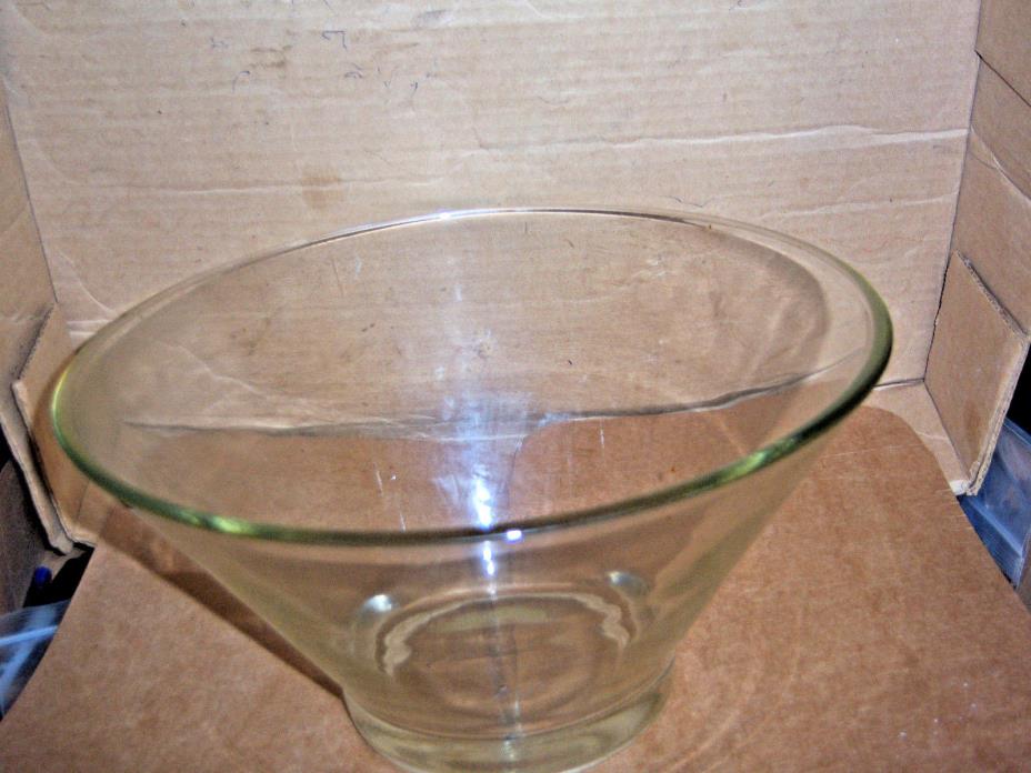 solid glass bowl measuring six and one half high eleven inch round