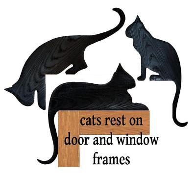 Silhouette cats set of three sitter rester and jumper plastic with wood grain