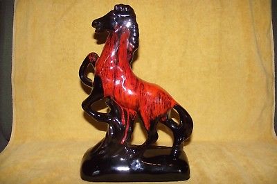 Glaze orange black pottery BMP CCC ?? Galloping rearing horse stallion figurine