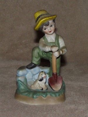 Taiwan made porcelain boy dog shovel farmer vintage figurine