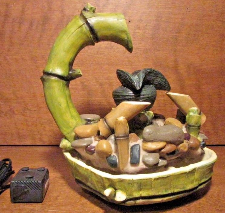 new Bamboo water fountain with moving bamboo shoots absolutley soothing relaxing