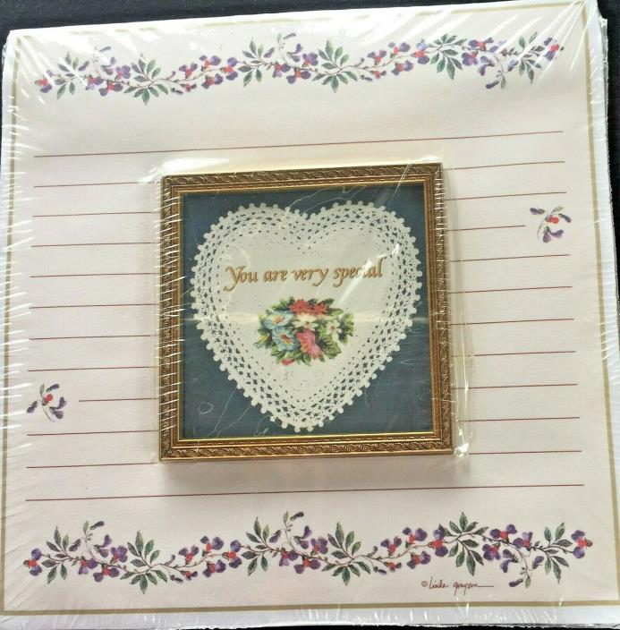 Note Pad with small little frame that says 