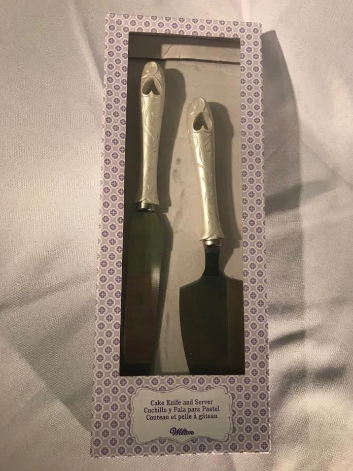 WILTON CAKE KNIFE AND SERVER PEARLIZED HANDLE WITH PIERCED HEART