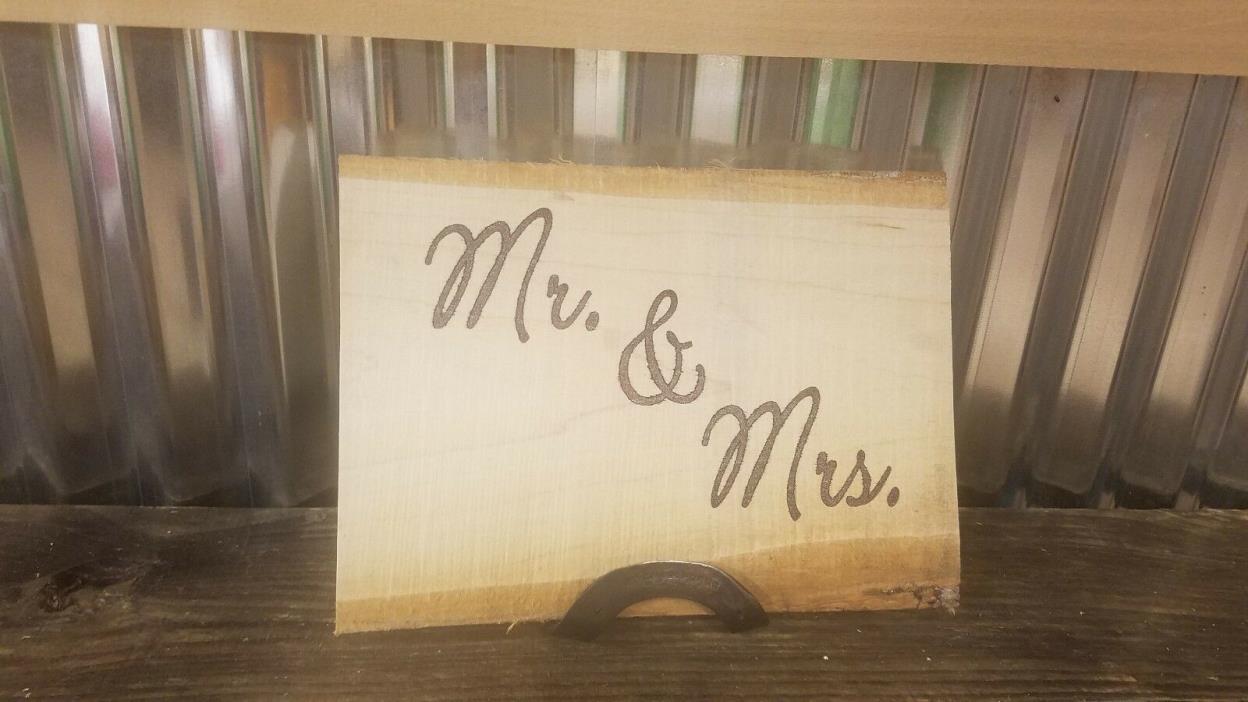 Mr. and Mrs. sign with hand forged horseshoe sign holder