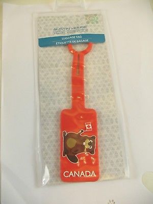 Austin House luggage tag red with beaver holding Canadian Flag