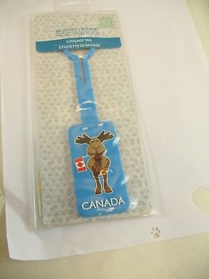 Austin House luggage tag blue with moose holding Canadian Flag
