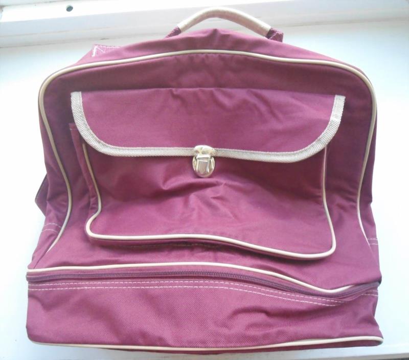 BURGUNDY TRAVEL BAG, NEW WITHOUT TAGS