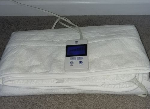 Massage table heating pad