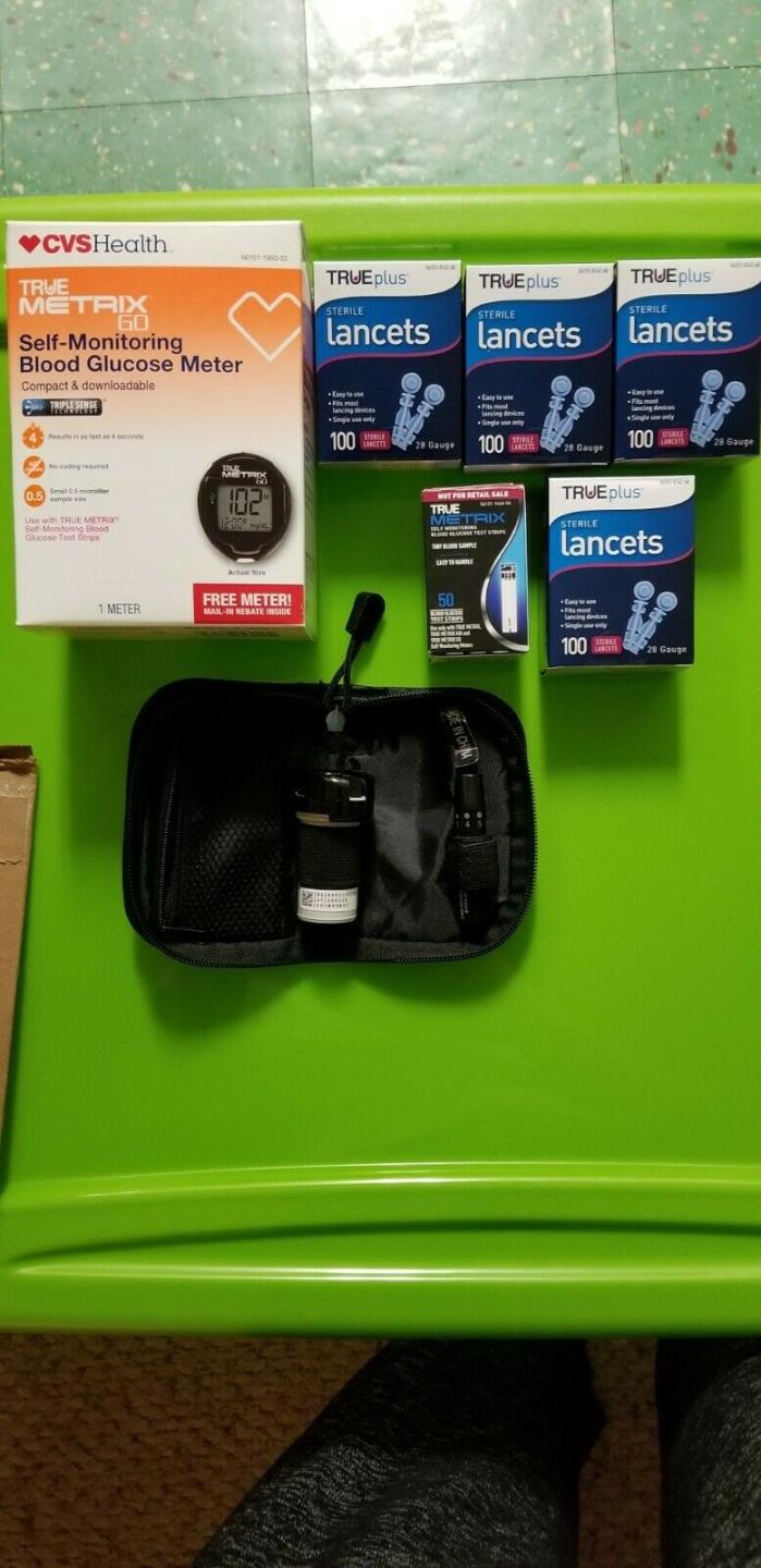 Blood glucose meter with carrying case, lancets and test strips