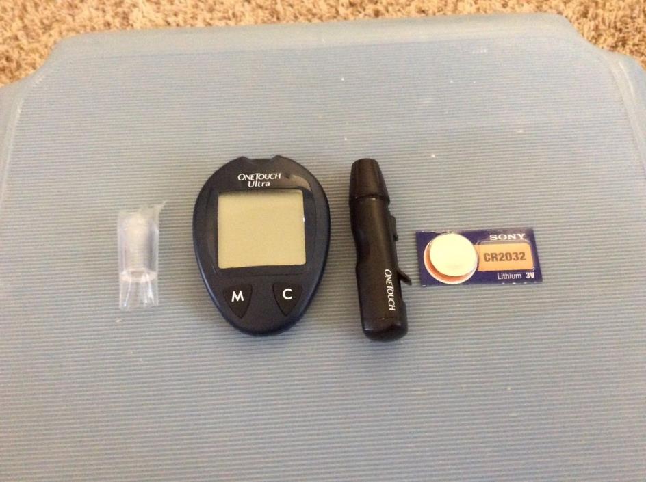 One Touch Ultra Meter, lancing device, clear cap and new battery