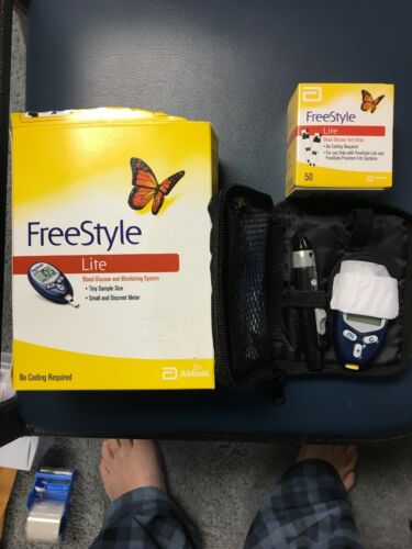 Freestyle Lite Monitoring system and  50 strips