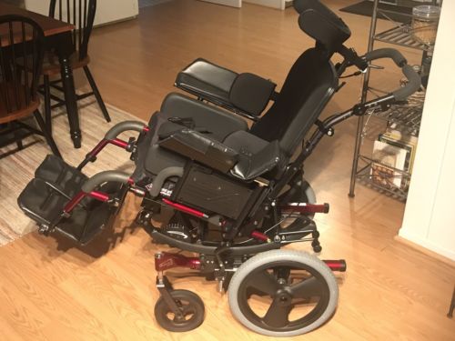 Quickie/Zippie Iris wheelchair one year old red, recliner w/ adjustable