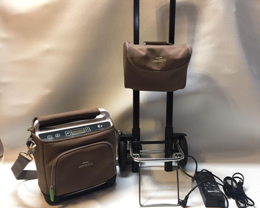 Phillips Respironics SimplyGo with Hand Cart, Carrying Case and Wall Charger.