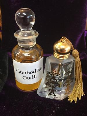 CAMBODIAN OUD IN A DECORATIVE REFILLABLE AJMAL BOTTLE 3 ML. 100% ALCOHOL FREE
