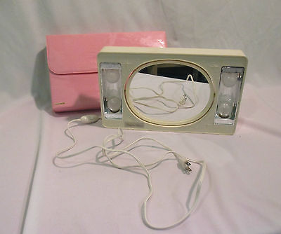 VINTAGE ELECTRIC DELIGHTED MAKEUP MIRROR WITH PINK VINYL CASE FLIPS TO MAGNIFY