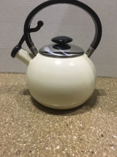 Whistling Tea Kettle Beige In Color With Stainless Steel Lid Black Handle