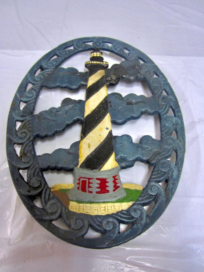 Vintage cast iron lighthouse trivet  9X7