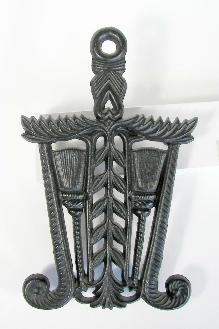 Black Metal Trivet by Wilton.  Broom Design.