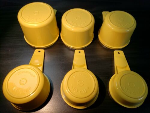 Vintage NEW original bag &  Tupperware measuring cups Yellow 6 cup complete set.