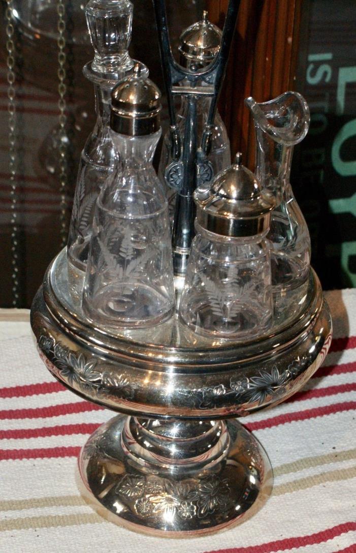 ANTIQUE/VINTAGE ERA CASTOR SET! SILVER COLORED WiITH FIVE CONTAINER STAND