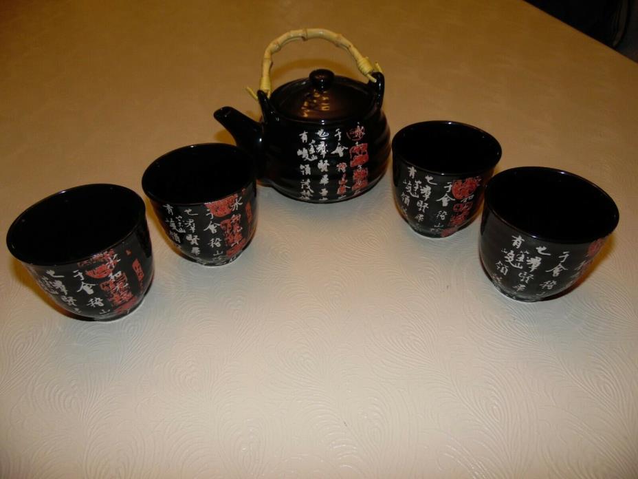 One Black Porcelain 14 Oz Teapot with Bamboo Handle and Four Matching 6 Oz Cups
