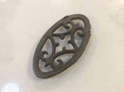 Antique Oval Cast Iron Toy Footed Trivet for Sad Iron