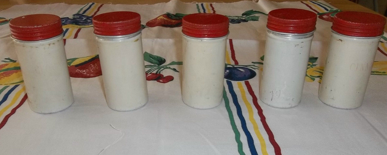 1940's lot FIVE RED LIDDED CREAMY WHITE TIN SPICE HOLDERS