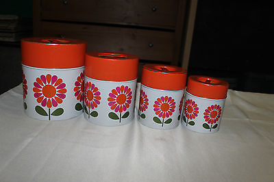Vintage Shabby Chic 4 metal canister set with lids. Flowers
