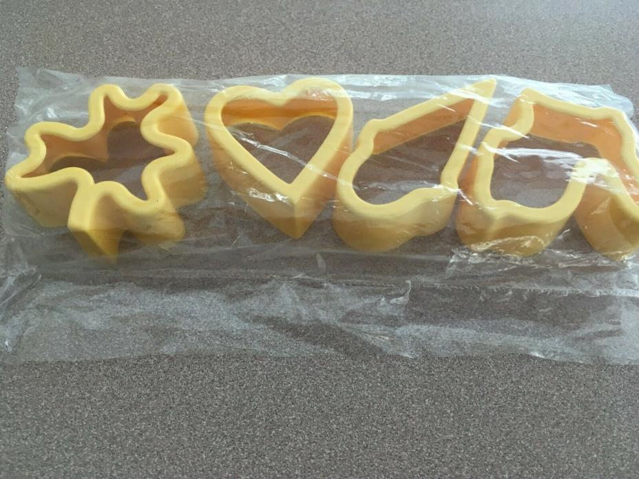 TUPPERWARE Cookie Cutters Yellow Set of 4 NEW Bunny-Heart-Leaf-IceCream Cone