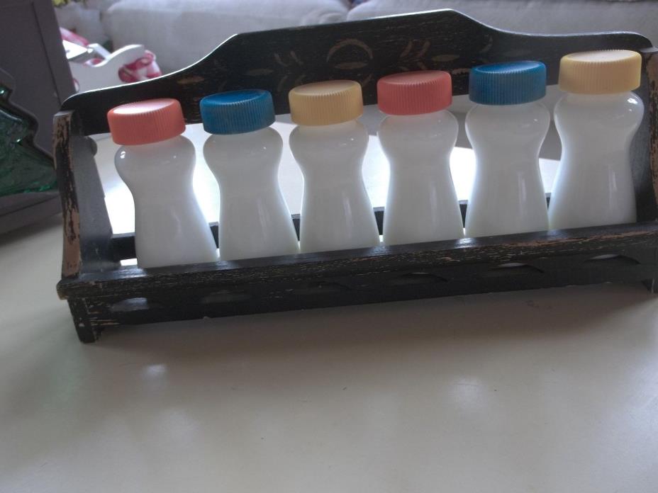 Vintage Glass Bottles with Colorful Tops Distressed Wooden Rack for Spices
