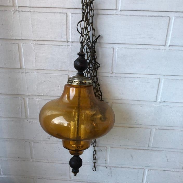 Mid Century  Hanging Swag Lamp with brass and amber glass in great shape