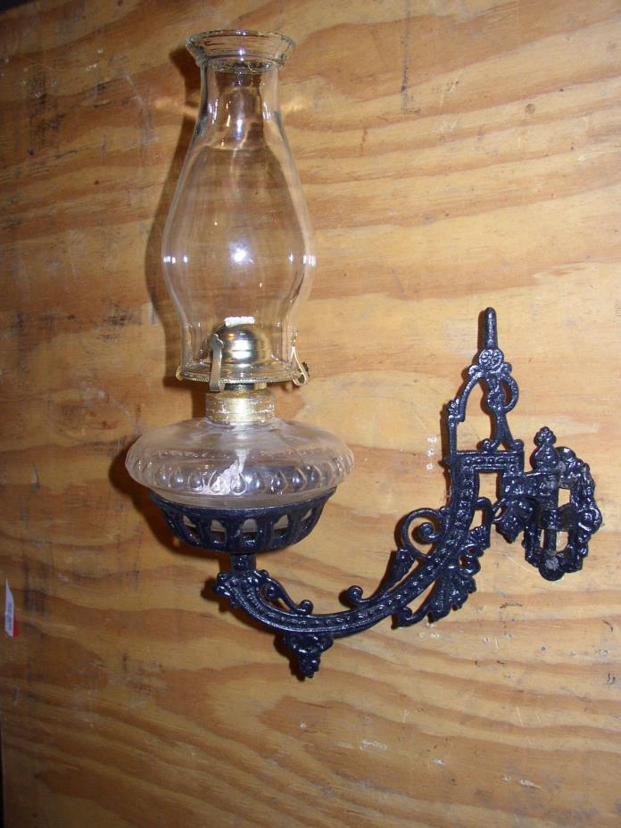 Cast iron wall mount holder (sconce) with oil lamp