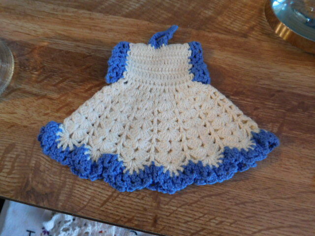Hand crocheted pot holder in shape of a dress