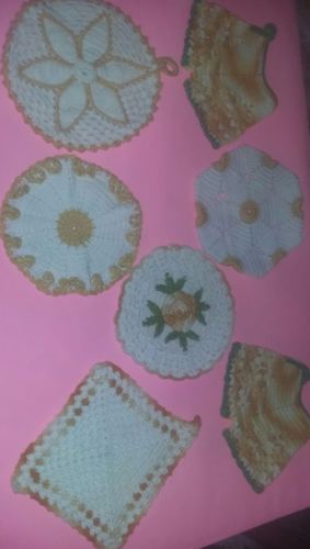 7 Vintage Hand Crocheted Potholders. Golden yellow, White, and some with green.