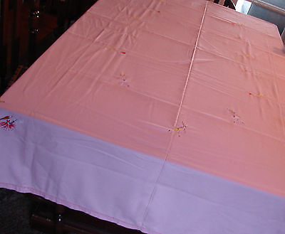 Embroidered pink table tops with flowers in cotton