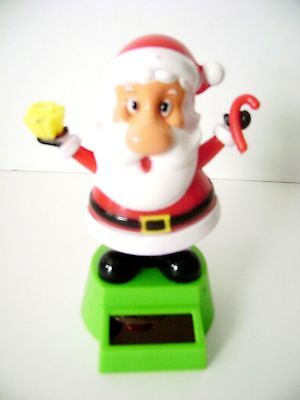 Solar Powered Bobble Head Santa Claus  / Holding Candy Cane & Present