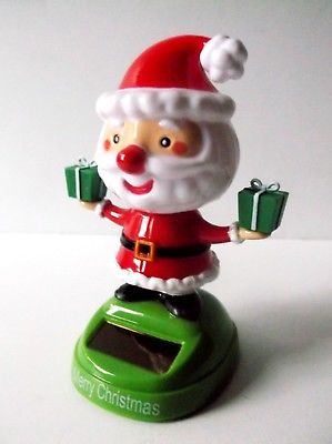 olar Powered Bobble Head Santa Claus  / Holding Two Presents