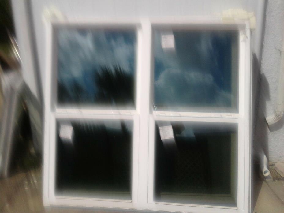4 NEW DOUBLE WINDOW GLASS DIMS 27.750 X 27.375 LOCAL PICK UP ONLY SEE DESCRIPTIO