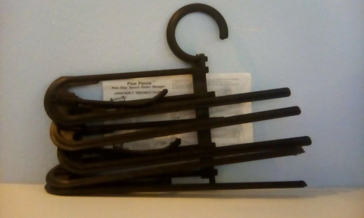 3 Space saver hangers. 5 pairs of pants or other garments.