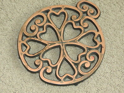 GOOD Pampered Chef cast iron + copper 2007 circle ornament? trivet - Round-Up...