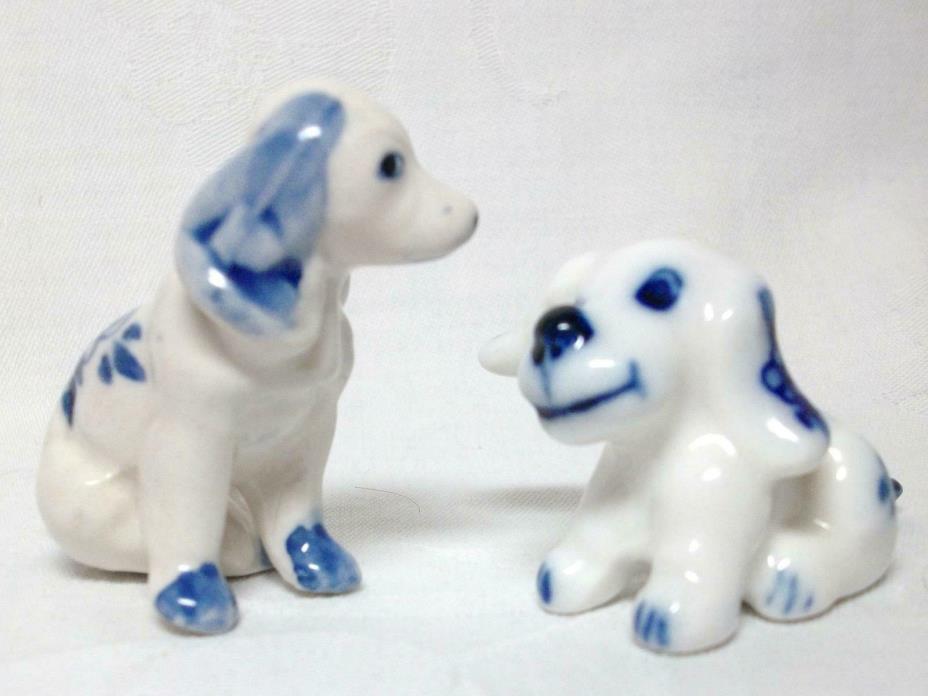 Two Porcelain Delft Blue & White Miniature Dogs Figurines