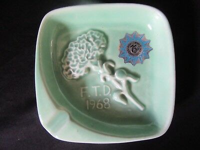 Hanger U.S.A. Pottery Ashtray F.T.D. 1968 Turquoise Glaze with Raised Carnation