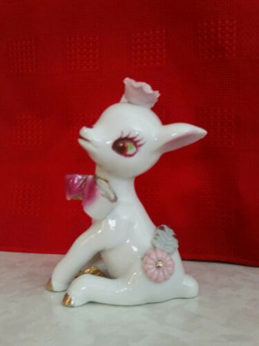 Rare Vintage White porcelain Reindeer With Pink Flower And Gold Hooves Figurine