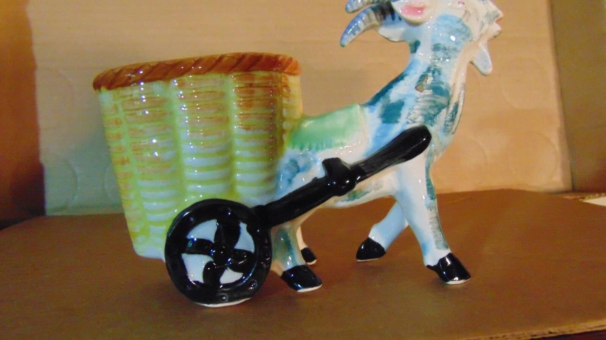 Antique porcelain, Japan, goat with cart.
