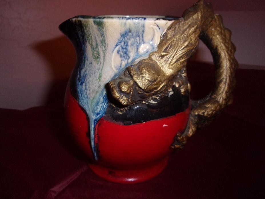 Japanese ceramic pitcher with gold dragon handle