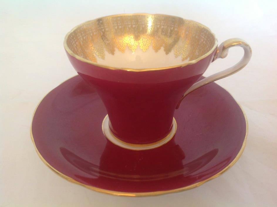 BONE CHINA CUP & SAUCER BY AYNSLEY RED WIHT HEAVY GOLD LACE INSIDE THE CUP