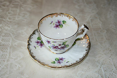 Aynsley tea cup , gold rim, scallopped saucer and cup, purple and white tea set